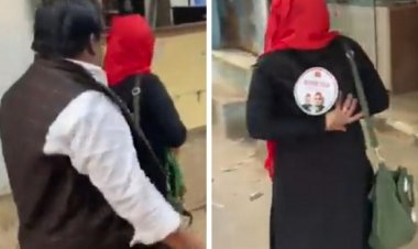 सपा कार्यकर्ता ने प्रचार के दौरान महिला के बुर्के पर लगाया स्टीकर, अनुराग ने कसा तंज