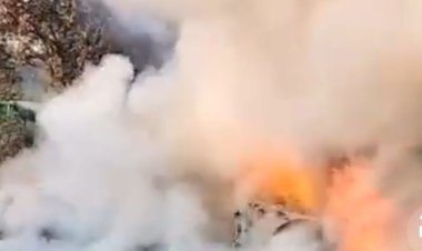 चलती हुई बीएमडब्ल्यू कार में लगी आग