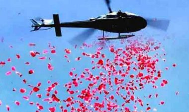 उप्र में कांवड़ियों पर हेलीकॉप्टर से पुष्पवर्षा, गूंजा हर-हर महादेव का जयघोष